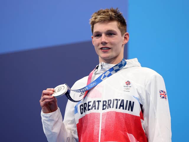 Silver medalist Duncan Scott of Team Great Britain celebrates during the medal ceremony for the Men's 200m Individual Medley Final on day seven of the Tokyo 2020 Olympic Games at Tokyo Aquatics Centre on July 30, 2021 in Tokyo, Japan. (Photo by Maddie Meyer/Getty Images)