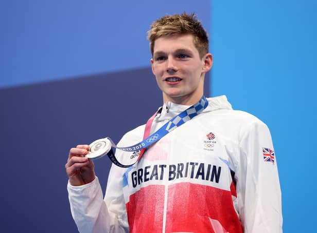 Silver medalist Duncan Scott of Team Great Britain celebrates during the medal ceremony for the Men's 200m Individual Medley Final on day seven of the Tokyo 2020 Olympic Games at Tokyo Aquatics Centre on July 30, 2021 in Tokyo, Japan. (Photo by Maddie Meyer/Getty Images)