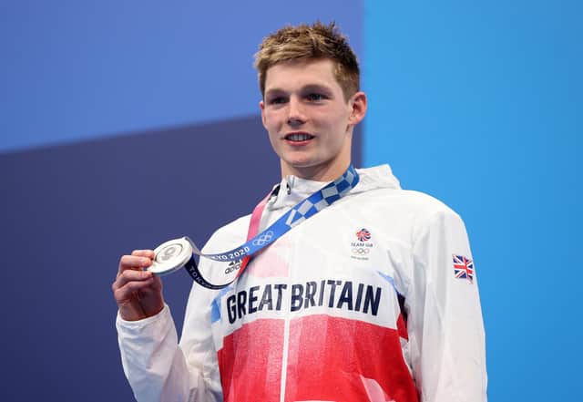 Silver medalist Duncan Scott of Team Great Britain celebrates during the medal ceremony for the Men's 200m Individual Medley Final on day seven of the Tokyo 2020 Olympic Games at Tokyo Aquatics Centre on July 30, 2021 in Tokyo, Japan. (Photo by Maddie Meyer/Getty Images)