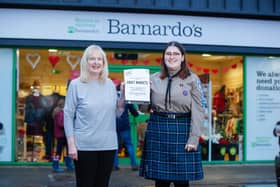 Explorer Scout Emma Harvey (15) joins Lisa McEwan, manager of the Barnardo's shop in Bonnybridge, where Emma is a volunteer