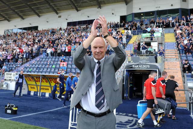 Alex Totten applauds the Falkirk faithful