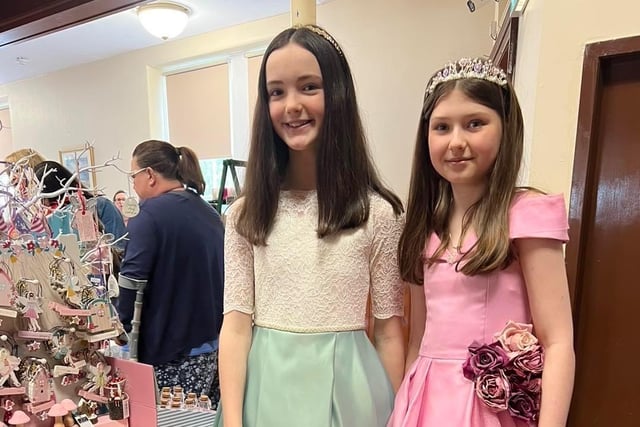 Current 2022 Chief Lady in Waiting Alice Markey and 2022 Queen of the Flower Girls Zoe Stewart in their dresses at the Bo'ness Fair for the Fair on Saturday.