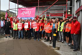 Postal workers on the picket line at Falkirk Delivery Office take part in the  first national strike in 11 years