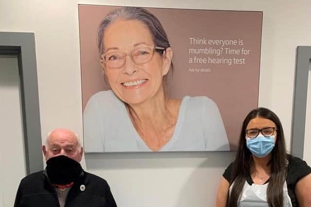 Granddad-of-eight George Spalding and Claudia McCue, hearing director at Specsavers Falkirk.