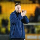 Scott Arfield applauds the Falkirk fans who made the trip to West Lothian on Tuesday night (Photo: Michael Gillen)
