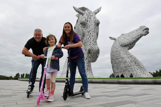 Mila Sneddon with mum Lynda and dad Scott at her fundraising event for Blood Cancer Awareness Month. Picture: Michael Gillen.