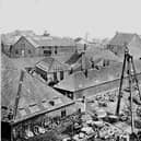 The Carron Iron Works 'triangle' with its bell on top.