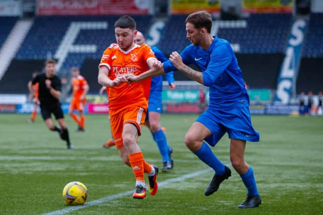 Goalscorer Kevin Fotheringham drives into the box from a wide area