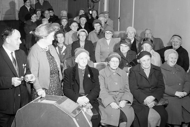 The Christmas draw at the Oxgangs Branch of the OAP Association in December 1964.