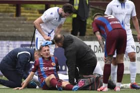 It was a busy afternoon for Stenny's physio Michael Gallacher (Photo: Alan Murray)