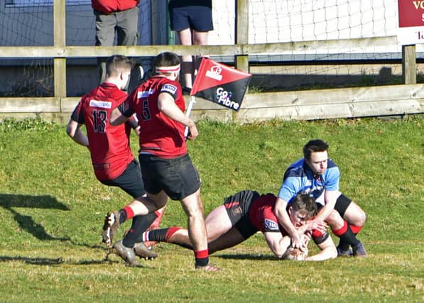 Lewis Wells (pictured touching down) scored a hat-trick last weekend (Library pic by Graham Black)