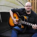 Scott Ashworth, musician and veteran, is releasing his Casualties of War EP this month to raise funds for the charity Combat Stress (Picture: Michael Gillen, National World)