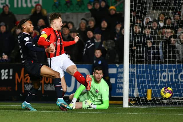 Substitute Rumarn Burrell rounded off the scoring in injury-time for Falkirk