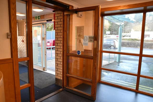 A fire door in Glenbrae Court is wedge open