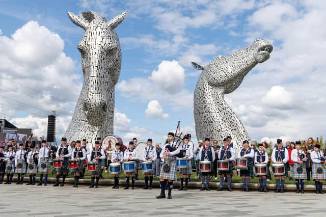 James Silcock, 13, and his bandmates from Falkirk Schools Pipe Band perform the Kelpies 10 Reel he wrote to celebrate the occasion.