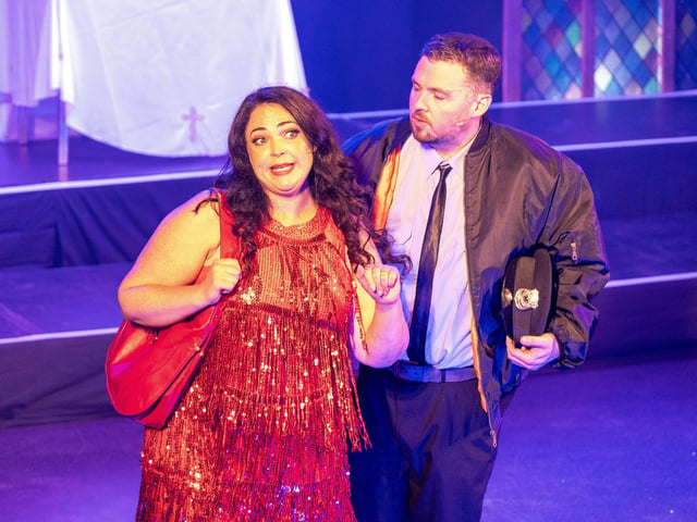Deloris seeks help from police officer Eddie (Andrew Tasker)