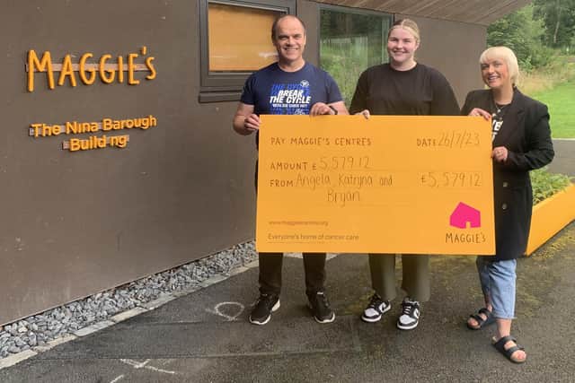 Bryan and Angela present cheque to Maggie's Forth Valley.