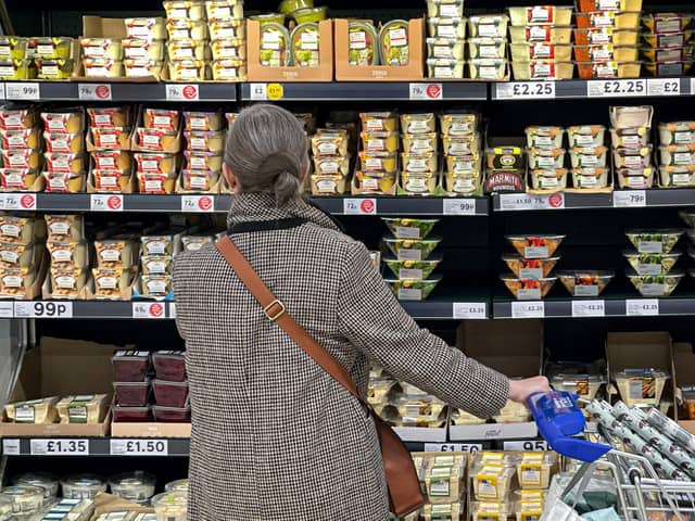 Before supermarkets, shoppers would go round lots of independent shops to pick up their weekly groceries. Pic: Getty