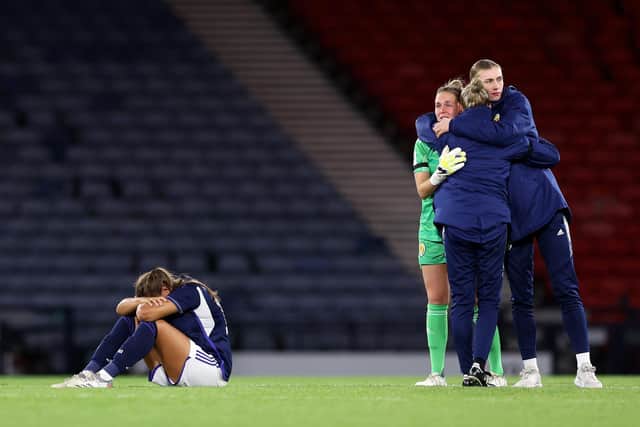 Crestfallen - Scotland's squad at full time on Tuesday night (Pics by Ross MacDonald/SNS Group & Ian Macnicol/Getty Images)