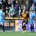 Falkirk fans at Alloa's Indodrill Stadium look on in dismay Conor Sammon scores against his old club