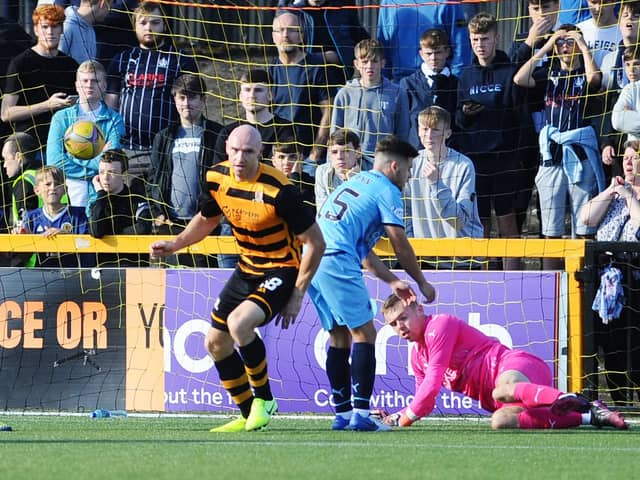 Falkirk fans at Alloa's Indodrill Stadium look on in dismay Conor Sammon scores against his old club