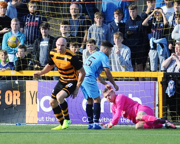 Falkirk fans at Alloa's Indodrill Stadium look on in dismay Conor Sammon scores against his old club