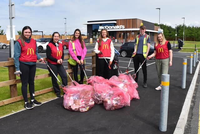McDonald's staff pick litter at Camelon