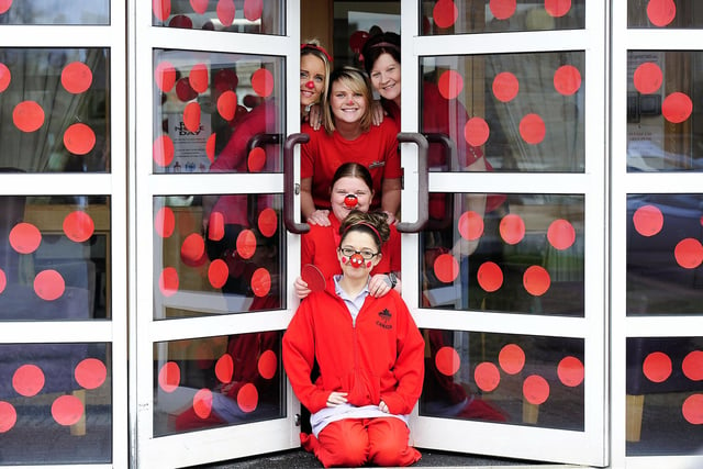 Staff at Caledonian Court Care Home in Larbert ready for Red Nose Day 2017.  Standing; Stacey Inch, care assistant; Megan Geddes, reception and Ayesha Khan, domestic. Kneeling Colette Mclintock, care assistant and Kirsty Fish, care assistant.