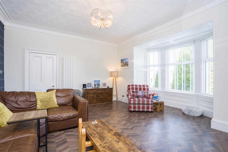 The family living room enjoys a large bay window.