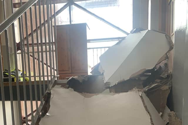 A section of the roof at the block of flats collapsed and fell into the close last week (Picture: Submitted)