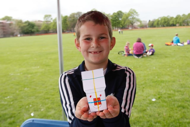Aaron, 8, from Grangemouth, creates a house for flood plain testing.
