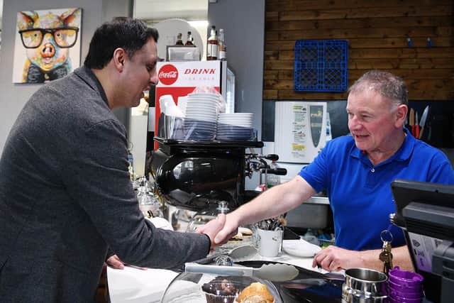 Scottish Labour leader Anas Sarwar meets Giles Nicholl owner of Finnigans during his visit to Falkirk on Tuesday. Pic: Michael Gillen
