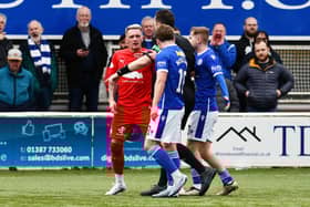 Callumn Morrison in action against Queen of the South (Photo: Michael Gillen)