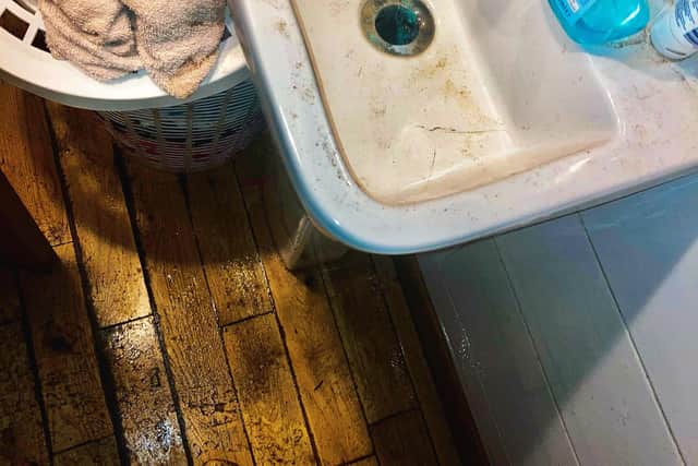 A sink and flooring was left covered in faeces after a toilet exploded in a Bonnybridge property. Contributed.