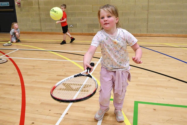 A budding tennis star of the future perhaps.