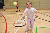 A budding tennis star of the future perhaps.