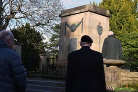 A small number of people gathered at Falkirk Cenotaph at 11am to mark Remembrance Day