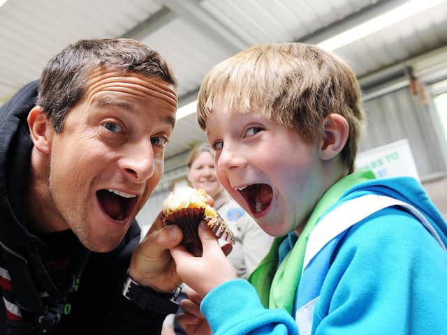 Bear Grylls and his son Marmaduke Grylls share a cupcake