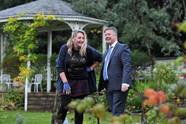 Keith Brown visiting Dollar Park Walled Gardens to view work carried out by people on unpaid work programmes. Also pictured Laura Mulcahy, Cyrenians garden supervisor (Pic: Michael Gillen)