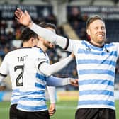 FALKIRK, SCOTLAND - FEBRUARY 08: Falkirk's Scott Arfield celebrates as he scores to make it 1-0 during a William Hill Championship match between Falkirk and Partick Thistle at The Falkirk Stadium, on February 08, 2025, in Falkirk, Scotland. (Photo by Paul Byars / SNS Group)