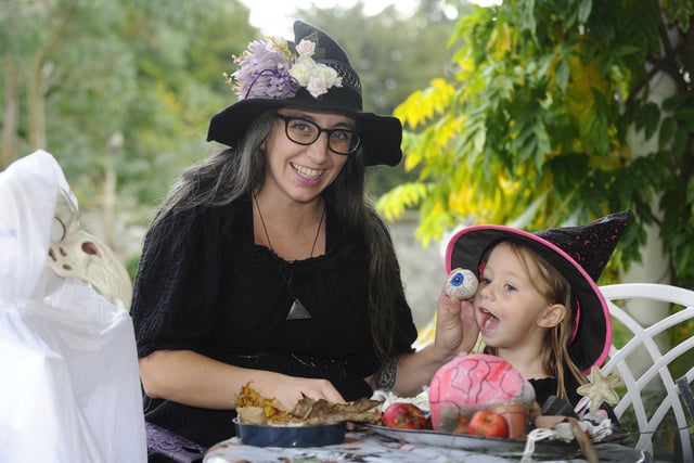 Aini and Lillith Perez (3) enjoy the Hallowe'en themed event on Saturday.