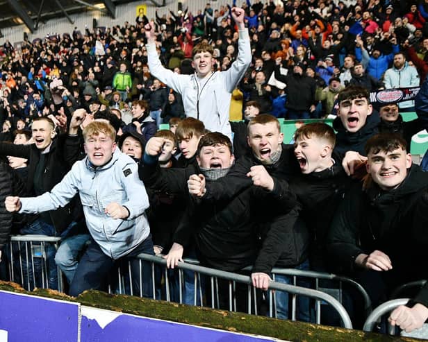 Falkirk fans celebrate the 2-1 home win over Ayr United in the Scottish Cup quarter-finals (Pic Michael Gillen)