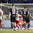 Gabby McGill fires past PJ Morrison to put Airdrie into the lead against Falkirk (Pictures by Alan Murray)