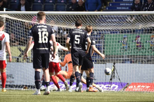 Gabby McGill fires past PJ Morrison to put Airdrie into the lead against Falkirk (Pictures by Alan Murray)