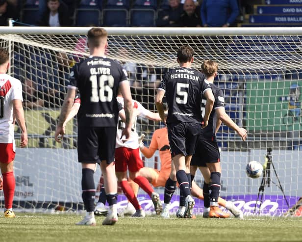 Gabby McGill fires past PJ Morrison to put Airdrie into the lead against Falkirk (Pictures by Alan Murray)