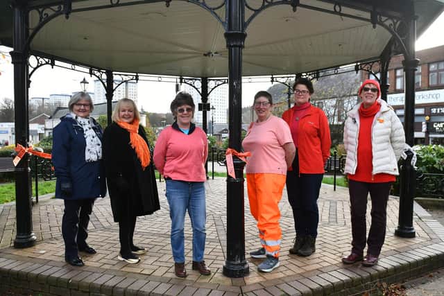 Soroptimists International Falkirk tying orange ribbons to lampposts to mark United Nations Global Campaign 16 Days of Activism Against Gender based Violence. Picture: Michael Gillen