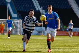 Shire's Robbie Young battles for possession in one of their meetings this campaign with Rangers B (Picture: Scott Louden)