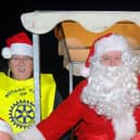Santa will have a new electric 'sleigh' when he hits the streets of Grangemouth in 2023 - a far cry from 2011 when he joined the Rotary Club of Grangemouth's collection in his petrol powered ride
(Picture: John Devlin, National World)
