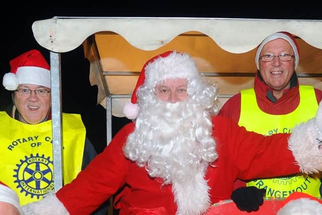 Santa will have a new electric 'sleigh' when he hits the streets of Grangemouth in 2023 - a far cry from 2011 when he joined the Rotary Club of Grangemouth's collection in his petrol powered ride
(Picture: John Devlin, National World)