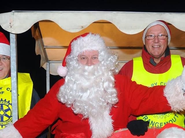 Santa will have a new electric 'sleigh' when he hits the streets of Grangemouth in 2023 - a far cry from 2011 when he joined the Rotary Club of Grangemouth's collection in his petrol powered ride
(Picture: John Devlin, National World)